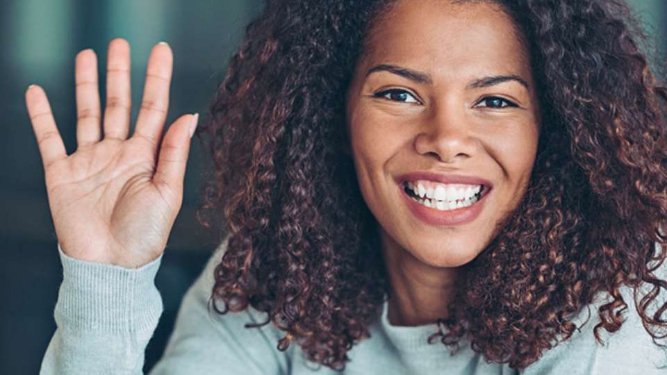 Woman waving