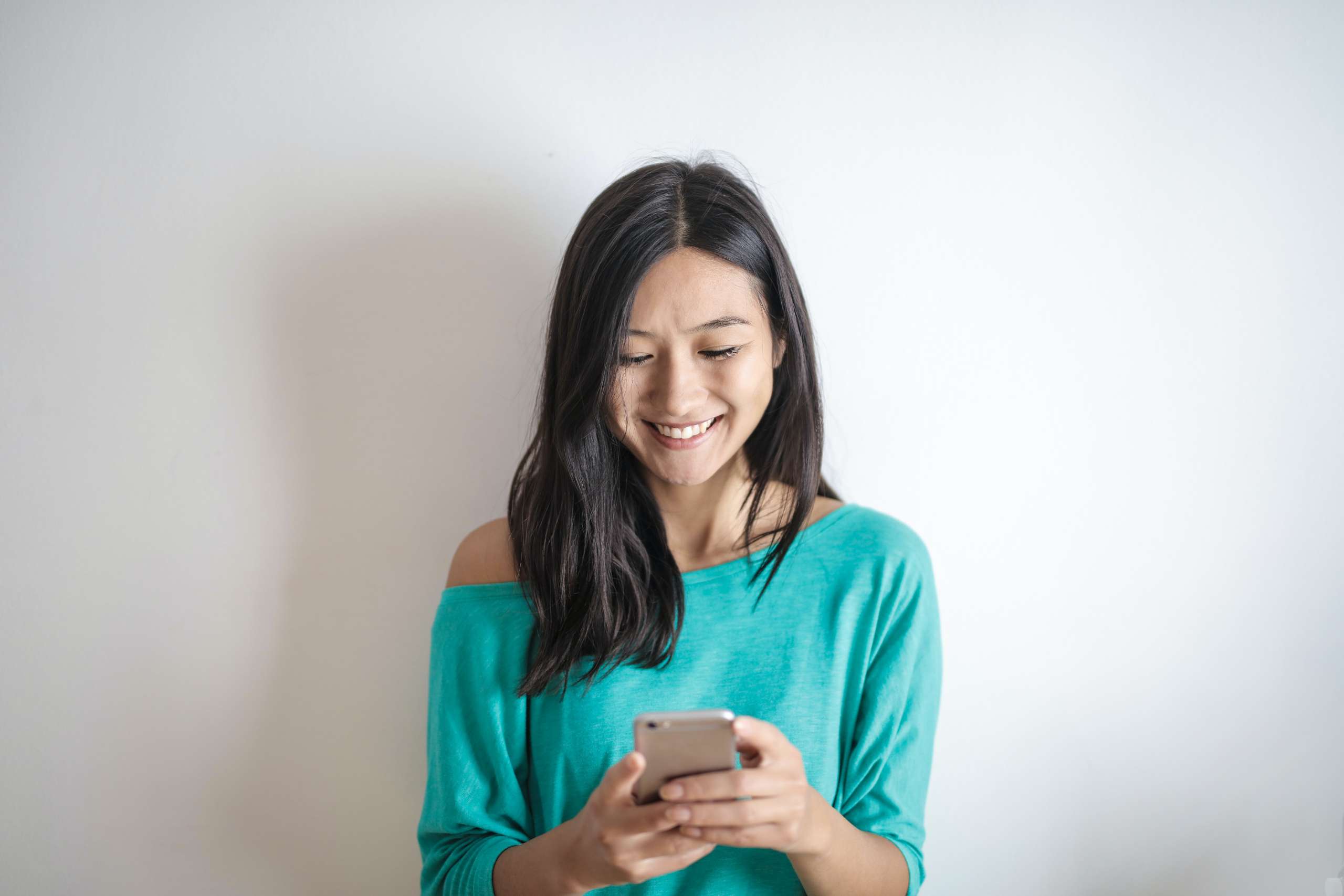 young woman looking at her phone